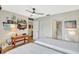 Bright bedroom with two twin beds, flat screen tv, and convenient closet space at 4646 Longwater Chase # 98, Sarasota, FL 34235