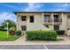 Charming two-story condo featuring a private entrance and well-maintained landscaping at 4646 Longwater Chase # 98, Sarasota, FL 34235