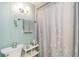 Bathroom with a toilet, shower curtain, and vanity at 491 Cervina Dr, Venice, FL 34285