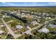 Waterfront community featuring houses along canals, offering boating access and scenic views of the water at 5140 Administration St, Port Charlotte, FL 33948