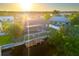 Beautiful waterfront home with screened lanai and private dock to enjoy sunrises and outdoor living at 5140 Administration St, Port Charlotte, FL 33948