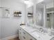 Bright bathroom with double sinks, marble countertops, and modern decor at 5140 Administration St, Port Charlotte, FL 33948