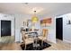 Cozy dining area with modern lighting and a convenient coffee and beverage station at 5140 Administration St, Port Charlotte, FL 33948