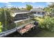 This waterfront home features a private dock and screened-in lanai, perfect for enjoying the water at 5140 Administration St, Port Charlotte, FL 33948