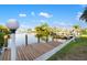 A beautiful dock is ready for boats and fishing and a backyard ready for relaxation at 5140 Administration St, Port Charlotte, FL 33948