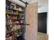 Organized pantry with ample shelving and a stylish sliding barn door at 5140 Administration St, Port Charlotte, FL 33948