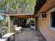 Covered patio with brick flooring perfect for entertaining at 602 Bonito Ave, Nokomis, FL 34275