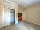 Bedroom with neutral walls, patterned flooring, large closet, and doorway to another room at 602 Bonito Ave, Nokomis, FL 34275