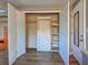 Spacious open closet with shelving and drawers offers plenty of storage space in this home at 602 Bonito Ave, Nokomis, FL 34275