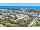 Expansive aerial view of a waterfront community with canal access to the ocean and lush landscaping at 608 Fair Winds Dr # 608, Nokomis, FL 34275