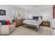 Cozy bedroom with natural light, neutral tones, and comfortable furniture offer a relaxing retreat at 608 Fair Winds Dr # 608, Nokomis, FL 34275