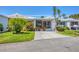 Charming single Gathering home with well-manicured yard and lovely curb appeal at 608 Fair Winds Dr # 608, Nokomis, FL 34275