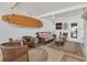 Cozy sun room with bright natural light, comfortable seating, and decorative elements create an inviting atmosphere at 608 Fair Winds Dr # 608, Nokomis, FL 34275