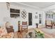 A relaxing sun room featuring comfortable seating and stylish decor, ideal for unwinding at 608 Fair Winds Dr # 608, Nokomis, FL 34275