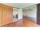 Spacious living room featuring a barn door that leads to an ensuite bathroom at 618 Bird Bay S Dr # 110, Venice, FL 34285