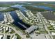 Aerial view of community with boating, pool, tennis and community center at 700 Blackburn Blvd, North Port, FL 34287