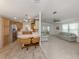 Open concept living room and kitchen area, great for entertaining guests at 700 Blackburn Blvd, North Port, FL 34287