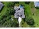 Beautiful home with a screened-in pool, long driveway and lush landscaping at 8209 Snowy Egret Pl, Bradenton, FL 34202