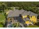View of a screened-in pool and lush landscaping at 8209 Snowy Egret Pl, Bradenton, FL 34202