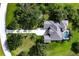 Beautiful home with a screened-in pool, long driveway and lush landscaping at 8209 Snowy Egret Pl, Bradenton, FL 34202
