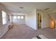 Bright bonus room with neutral walls, multiple windows, and a cozy reading nook for relaxing at 8209 Snowy Egret Pl, Bradenton, FL 34202