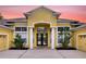 Stunning exterior of this home with a well-manicured lawn and grand entrance at 8209 Snowy Egret Pl, Bradenton, FL 34202