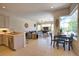 Bright, open living area featuring neutral tones, large windows, tile floors and a seamless flow to the outdoors at 8209 Snowy Egret Pl, Bradenton, FL 34202