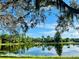 Enjoy tranquil water views of the beautiful pond in this backyard at 8209 Snowy Egret Pl, Bradenton, FL 34202