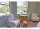 Cozy sitting area within the main bedroom, offering a peaceful retreat at 8209 Snowy Egret Pl, Bradenton, FL 34202