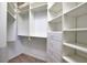 Spacious walk-in closet with built-in shelving and ample storage space at 8209 Snowy Egret Pl, Bradenton, FL 34202
