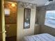 This bedroom includes access to an adjacent bathroom and vanity space at 834 Cervina S Dr, Venice, FL 34285