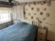 Bedroom featuring a bed and nightstand at 834 Cervina S Dr, Venice, FL 34285