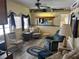 Cozy living room with comfortable seating and natural light at 834 Cervina S Dr, Venice, FL 34285