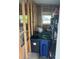 Image of a cluttered storage shed interior with visible wooden framing and windows at 834 Cervina S Dr, Venice, FL 34285