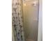 Standing shower featuring a shower curtain with a tropical design at 834 Cervina S Dr, Venice, FL 34285