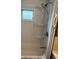 Shower stall featuring a shower head and hand rail at 834 Cervina S Dr, Venice, FL 34285