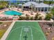 Aerial view of the community basketball court located adjacent to pool and clubhouse at 8409 Placida Rd # 206, Placida, FL 33946