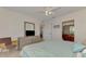 Bright bedroom with view to on-suite bathroom and kitchen area at 8409 Placida Rd # 206, Placida, FL 33946