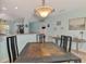 Bright dining area connects to the kitchen and features charming coastal-themed wall decorations at 8409 Placida Rd # 206, Placida, FL 33946