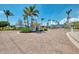 Welcoming entrance features lush landscaping and convenient access to community amenities at 8409 Placida Rd # 206, Placida, FL 33946