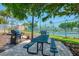 Community picnic area features multiple grills, perfect for outdoor cooking and entertaining at 8409 Placida Rd # 206, Placida, FL 33946