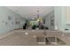 Open concept: Kitchen flows into living room area with view to outside at 8409 Placida Rd # 206, Placida, FL 33946