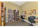 Cozy library space with bookshelves, a desk and chair, perfect for reading and quiet study at 8409 Placida Rd # 206, Placida, FL 33946