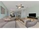 Expansive living area offering comfortable seating and connecting seamlessly to the dining room at 8409 Placida Rd # 206, Placida, FL 33946