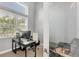 This home office features modern fixtures, natural light, and a serene view at 8634 Santa Cruz Dr, Port Charlotte, FL 33981