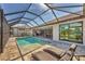 Enjoy this screened in pool and covered deck with plenty of space for entertaining at 8634 Santa Cruz Dr, Port Charlotte, FL 33981