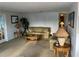 Comfortable living area with sofas, a coffee table, decorative lamps, and stylish decor at 868 Baveno Dr, Venice, FL 34285