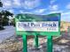 Sarasota County Blind Pass Beach Park sign, inviting visitors to enjoy the beautiful coastal scenery at 9118 Coachman Dr, Venice, FL 34293