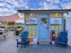 Charming boat rental shop with colorful exterior, offering kayaks, paddle boards, and dolphin sunset cruises at 9118 Coachman Dr, Venice, FL 34293