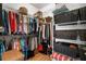 Organized walk-in closet with wire shelving, baskets, and ample storage space at 9118 Coachman Dr, Venice, FL 34293